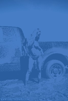 Admin-bikini-girl-showing-off-muddy-truck.jpg